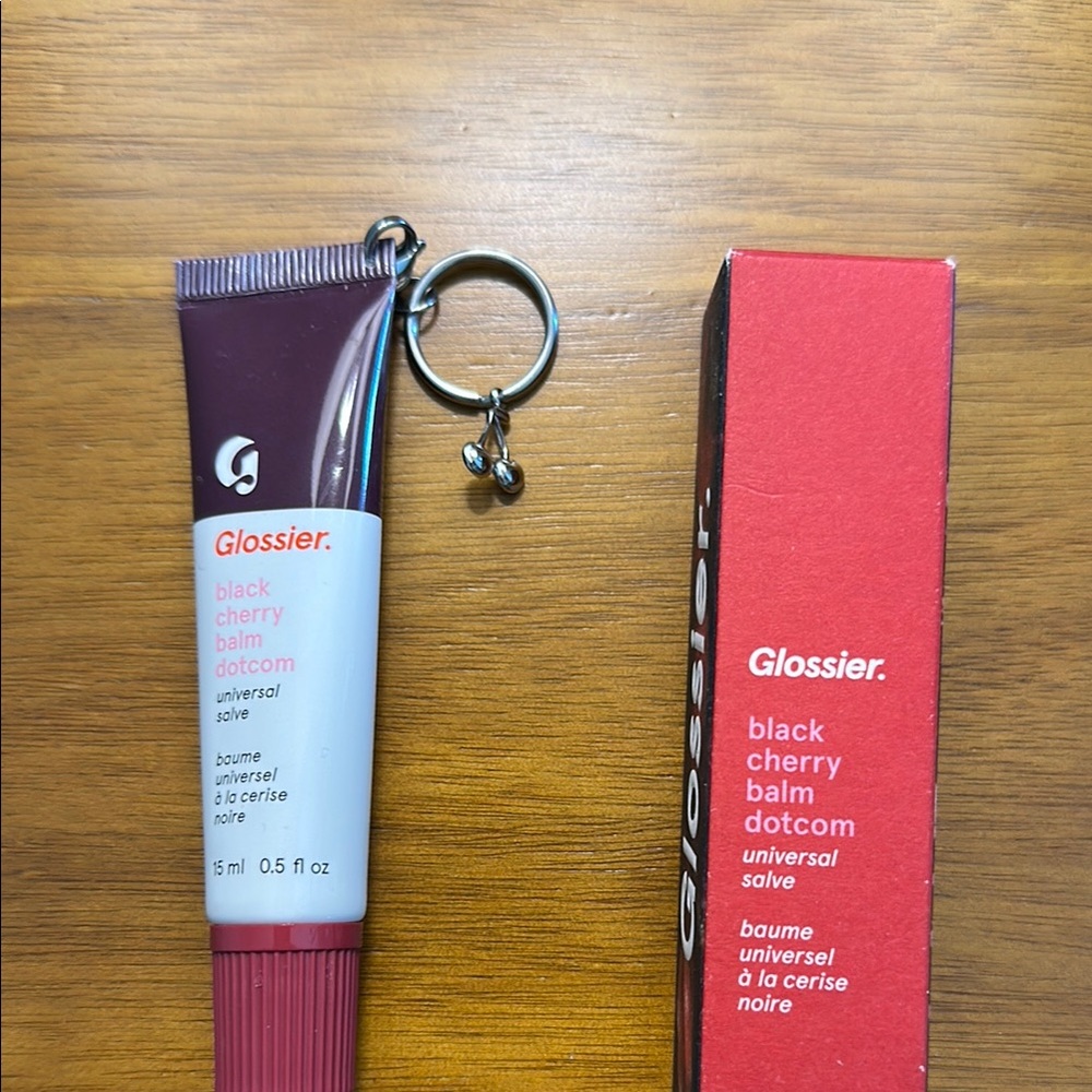 Glossier black cherry balm dotcom with cherry charm